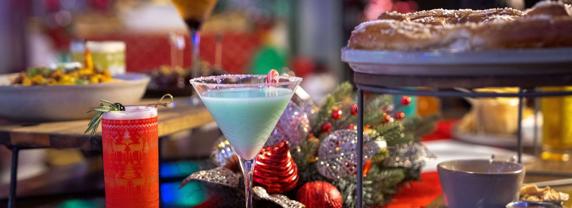 Holiday cocktails and food display in Tinsel & Tonic