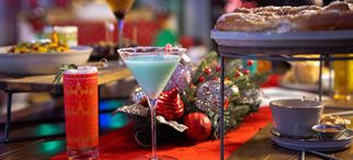 Holiday cocktails and food display in Tinsel & Tonic