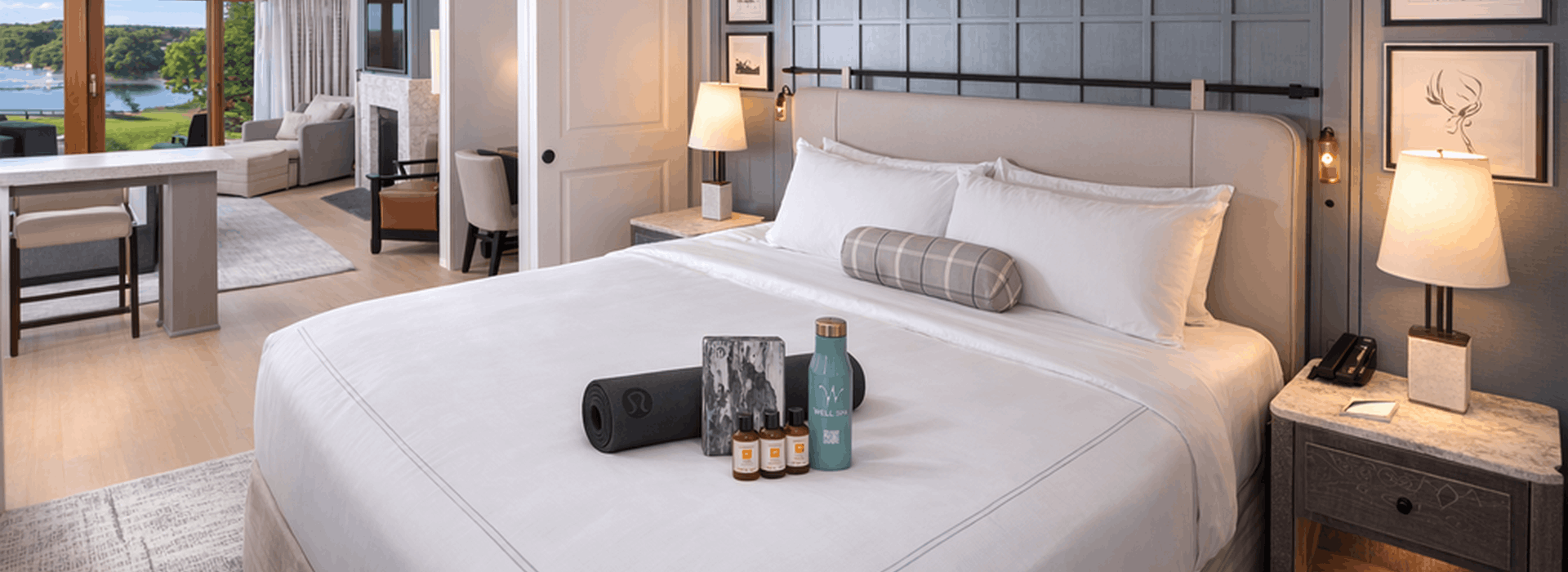 Wellness amenities waiting on the bed in a suite